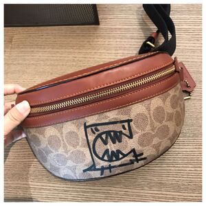 00emmaren_emma淘宝coach 小怪兽腰包belt胸包斜挎包