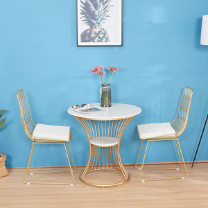 北欧大理石餐桌椅子金色镂空个性金属家具奶茶店咖啡厅休闲铁户外