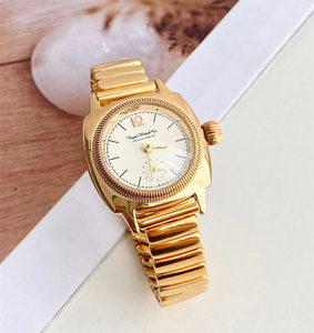 vague watch co日本新款复古金色时尚ins弹簧表带石英防水情侣表