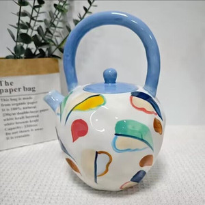 出口美国A*n创意时尚陶瓷艺术手捏感釉下彩绘提梁茶壶水壶凉水壶