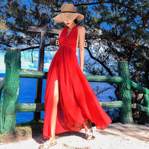 巴厘岛海边度假沙滩裙2024新款显瘦露背吊带连衣裙红色开叉长裙仙