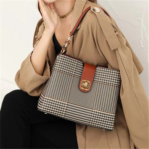 维克萨斯焦糖千鸟格肩跨斜挎女包个性桶包牛皮63966/80478/80502