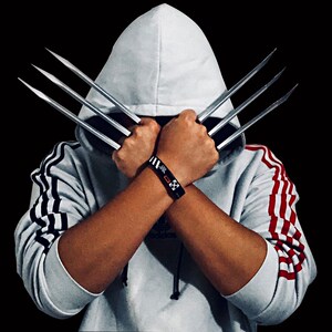 金钢狼爪子精钢狼爪金刚狼钢爪儿童玩具狼爪刀塑料的爪子新