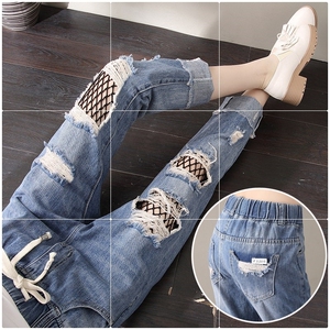 破洞渔网牛仔裤女松紧腰宽松显瘦哈伦韩版大码刺绣乞丐裤薄款九分