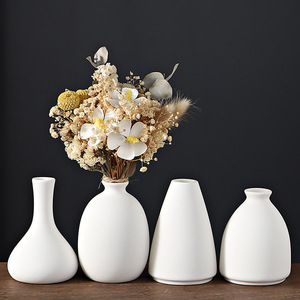 白色陶瓷花瓶批发北欧现代创意家居干花插花装饰摆件条纹素烧花瓶