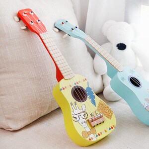 050人付款淘宝小吉他克里尤尤乐器琴琵琶挂板尤克里里小儿童小吉他