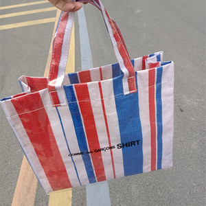 川久保玲cdgpvc防水折叠编织购物袋大容量上课手提袋红蓝白托特包