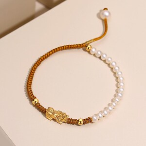 999足金黄金貔貅珍珠手链女转运珠编织绳手串送女友本命年珂兰