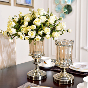 客厅电视柜两边摆的花电视机旁边的摆设花茶几上防真室内花草摆件