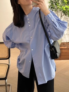 蓝色圆领长袖衬衫女春秋设计感小众不规则纽扣气质灯笼袖棉质衬衣