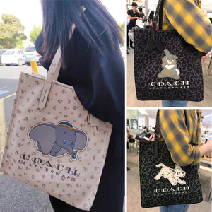 coach蔻驰女包迪士尼小飞象托特包帆布购物袋单肩手提包