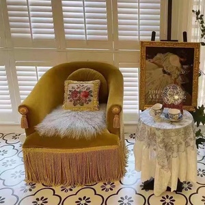 法式姜黄色丝绒流苏单人位沙发椅复古怀旧创意设计师实木休闲家具