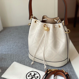 2021新款tb白色镂空水桶包复古刺绣女士印花抽绳单肩手提斜跨女包