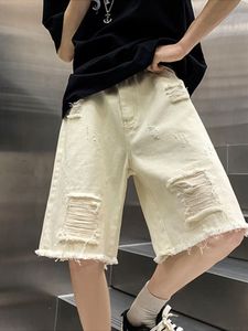 白色美式假破洞牛仔短裤男夏季设计感毛边五分裤宽松直筒乞丐裤子