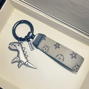 奢侈品包包饰品芝麻街中古挂饰汽车钥匙扣背包挂坠凡利歌得麦吉斯