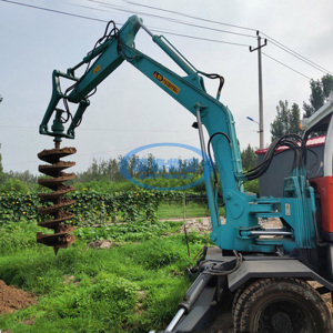 轮式挖掘机刨树根钻神器果园植树刨坑机树桩粉碎液压切碎树根机