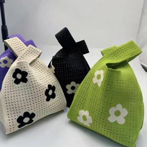 韩国ins小众设计针织棋盘镂空格子格小花针织包黑白手提袋腋下包