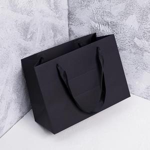 服装店手提袋高档纸袋定制包装衣服礼品黑色纸盒口袋简约高端结实