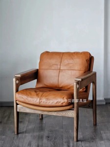 北欧简约现代实木真皮沙发椅家用客厅小户型设计师款老虎布艺椅子