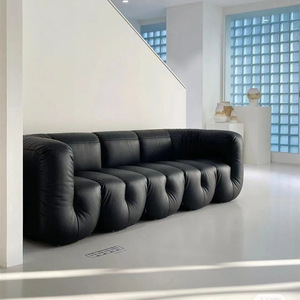 意大利设计师民宿复古黑色皮艺沙发北欧中古DS707拳头U型模块沙发