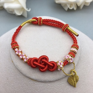 手工编织桃花如意结手链可diy穿黄金通孔珠铃兰吊坠八股女男红绳