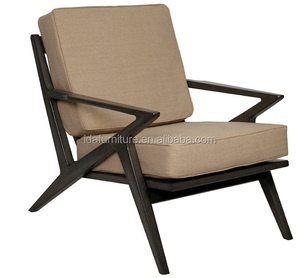 北欧现代艺术黑色实木皮质白色布艺软包单人沙发简约网红休闲椅