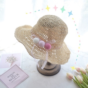 夏季新款超可爱雪纺带粉色毛球纸草编织镂空帽子软妹防晒遮阳帽女