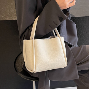 韩国小众荔枝纹夏天复古手提袋女通勤斜挎包软皮质感手拎包水桶包