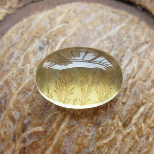 天然巴西水晶树水晶包裹软锰矿树形晶中晶椭圆弧面裸石