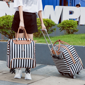 女士外出旅行包短期差手拉李箱提杆两用途时尚便携可带上飞机的布