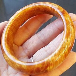 长白山琥珀木顺风包邮明子满油全透手串北沉香佛珠红松香木手镯