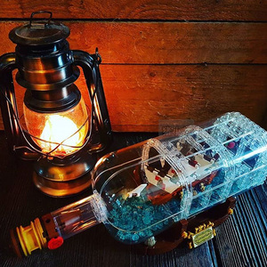 创意积木海盗船海上漂流瓶益智拼装瓶中船儿童小颗粒玩具灯光改装