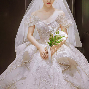 一字肩珍珠婚纱大拖尾2021新款网红高级感宫廷风重工奢华高端主纱