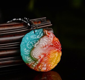 拍卖天然新疆戈壁金丝玉彩玉鸡血玉飘花麒麟七彩男女玉麒麟吊坠