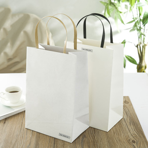 热销简约纯白色牛皮纸加厚小号礼品袋手提纸袋订做可印logo一个起