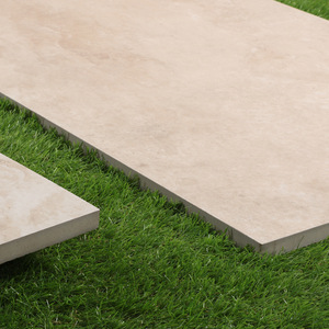 2cm厚仿罗马洞石米黄石英砖仿石pc砖6001200别墅销售大厅酒店景墙