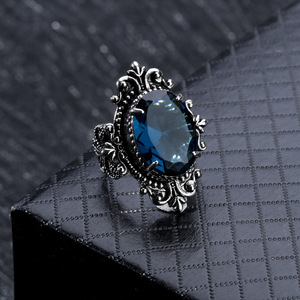 新款仿天然海蓝色托帕石戒指女欧美复古个性镀S925泰银鹅蛋形指环