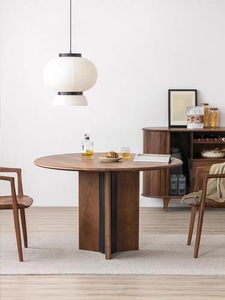 北欧轻奢纯实木圆餐桌设计师个性原木家具简约诧寂创意家用大圆桌