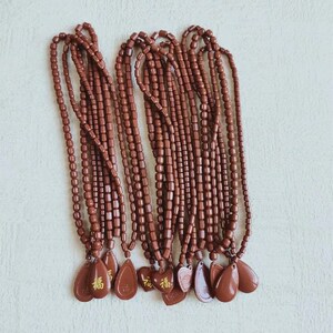 托玛琳项链锗石百搭水滴项链正品麦饭石电气能量石情侣项链送手链