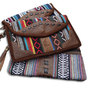 【瑞秋老奶奶】blue sheep 岩羊公益店 尼泊尔手工牛皮帆布手拿包