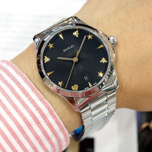 代购 gucci 古驰男士酷黑金边大表盘星星标时尚石英手表ya1264029