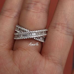 925银镀金梯方镶嵌交叉x排钻戒指手工镶钻