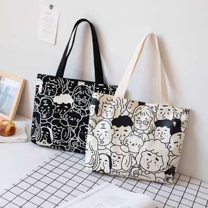卡通涂鸦图案印花帆布袋女文艺休闲拉链通勤手提托特包学生手拎包