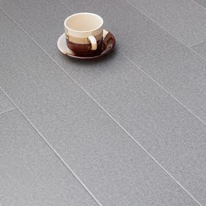 灰色布纹强化木地板纯色田园米灰色复合个性亚光家用防水背景12mm