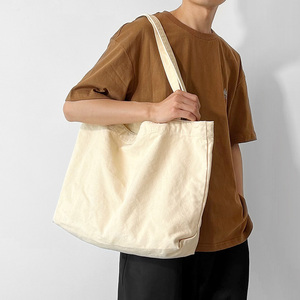 单肩包文艺范大容量女士购物袋简约慵懒风帆布包男时尚韩版手提包