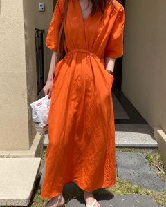 橘色棉麻连衣裙长款过膝长裙2024夏季新款高级感拖地裙宽松大码装