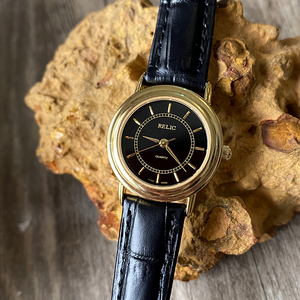 香港带回正品relic文艺黑金典细致竖条时刻镀金小圆盘石英女手表
