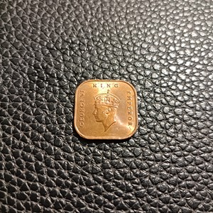 1945年马来亚1分完美品相铜币