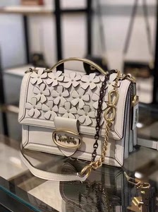 coach白色立体花朵风琴包斜挎包