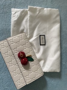 00tb8889554125淘宝二手gucci古奇女士woc白色牛皮樱桃链条包双g单